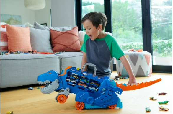 Hot Wheels T-Rex Transporter Hauler with Race Track Toy